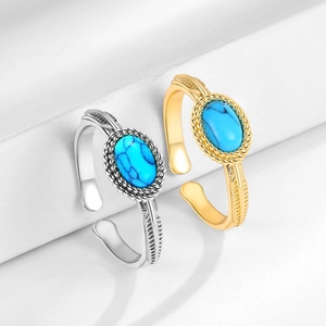 Vintage style turquoise open ring set in gold and silver finish with wheat textures