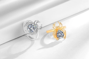 Detailed view of adjustable 18k gold spider ring featuring sparkling pear-cut zircon stones
