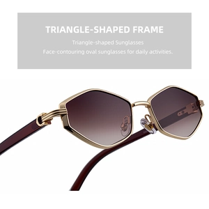 Detailed close-up of golden geometric metal frame and fine hinge design of sunglasses
