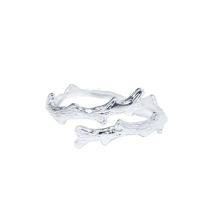 Detailed macro view of the unique silver tree branch texture on this open adjustable ring
