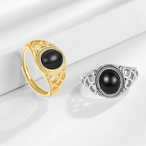 Retro oval black agate rings in gold and silver finish with hollow geometric patterns