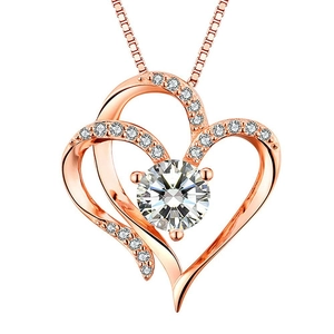 Elegant rose gold double heart pendant necklace with shimmering zircon accents and central stone