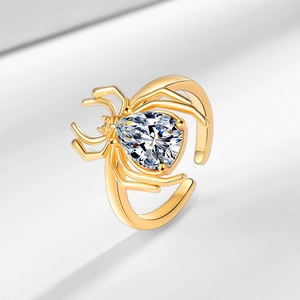 Gold plated 18k spider open ring featuring a sparkling pear-shaped zircon stone