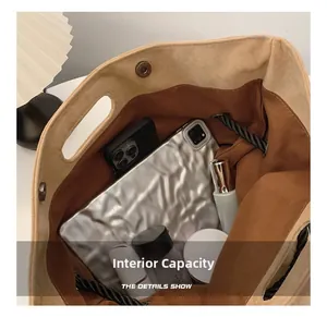 Interior view showing large capacity for tablet and cosmetics with magnetic buckle closure