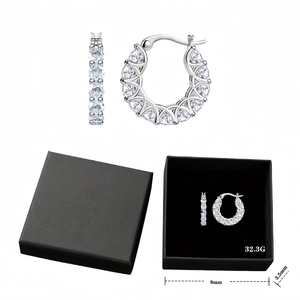 Iced out U-shaped stud earrings in silver finish with clear zircon stones and gift box