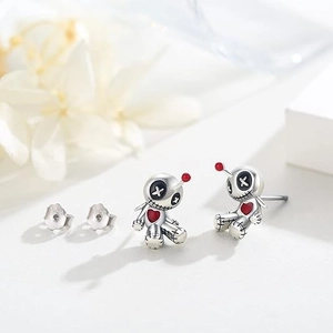 Gothic voodoo doll stud earrings in silver with red heart and cross stitch details