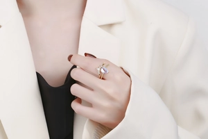 Detail showing double-layer crown ring with teardrop gemstone and marquise diamonds
