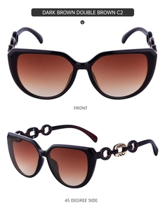 Detail of dark brown cat-eye sunglasses with gold metal chain accent on temples