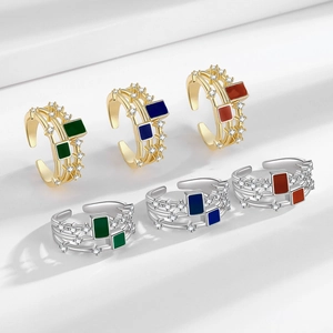 Three-layer adjustable ring with rectangular emerald stones and cubic zirconia accents