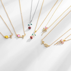 Elegant rose and tulip pendant necklace collection with gold and silver chain finishes