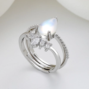 Two-piece silver crown ring set with teardrop moonstone and marquise zircon crystals