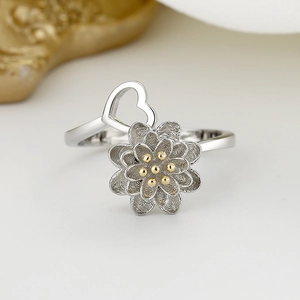Sunflower rotating silver ring with golden center and hollow heart design for women