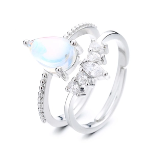 Double-layered silver crown ring set with pear-shaped moonstone and marquise zircon crystals