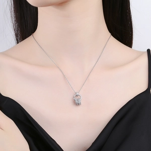 Elegant silver zircon necklace set featuring a nested circular pendant on a female model