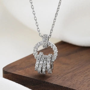 Elegant silver zirconia necklace featuring interconnected sparkling rings on a link chain