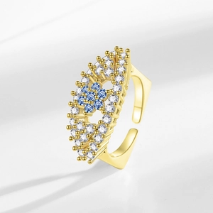 Luxurious gold adjustable ring with blue floral zirconia centerpiece and crystal pavé band