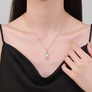 Squisita collana a sirena in oro con pietra blu e ciondolo a cuore in zircone rosa