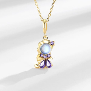 Collana principessa sirena dorata con pietra di luna cangiante e zirconi viola