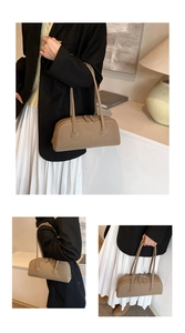 Detail view of khaki retro tote bag with white contrast stitching and zip closure