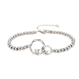 Silver beaded bracelet with interlocking rings and heart-shaped zircon stones