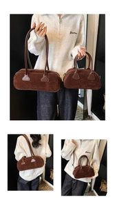 Detail view of retro brown suede bowling bag in large and small sizes for women