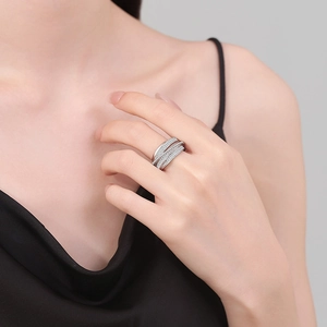 Luxurious crisscross multi-layer silver open ring with pavé zircon stones on finger