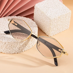 Chic polygonal metal frame sunglasses with light tea lenses and elegant gold finish