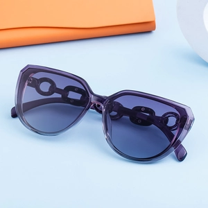 Chic purple chain-link sunglasses with gradient lenses and oversized transparent frame