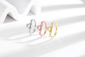 Adjustable Claddagh rings in gold, silver, and rose gold featuring heart and crown details