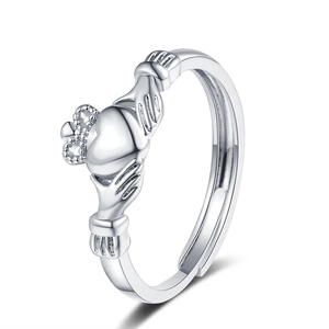 Silver Claddagh ring featuring two hands holding a heart with crown and adjustable open band