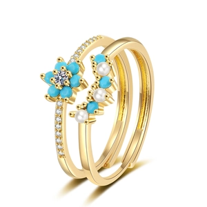 Blue forest flower ring set with pearls and gold plating in an adjustable open design