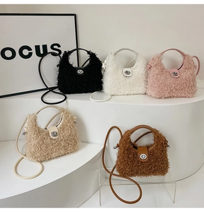 Row of plush teddy faux fur handbags in assorted colors with sleek metal lock closure