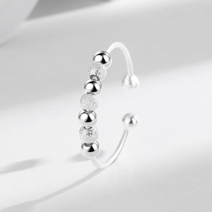 Minimalist S925 sterling silver spinning anxiety ring with polished and frosted beads