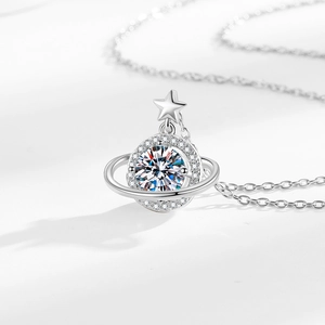 Star and planet planet necklace with silver orbit ring and sparkling pendant for women