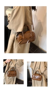 Detail view of a caramel brown leather bowling bag featuring decorative dual bows
