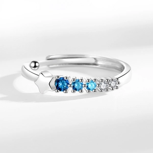 Adjustable silver star ring with gradient blue zircon stones in a minimalist design