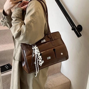 Retro dark brown large shoulder bag with multiple pockets and silver metal buckle