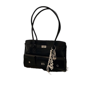 Vintage black leather shoulder bag with multiple pockets and metal buckle closure