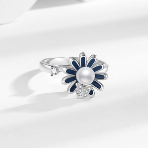 Rotating sunflower and butterfly open ring with blue enamel and white pearl