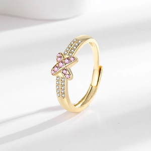 Elegant gold open ring with pink zircon cross symbol and double row crystals