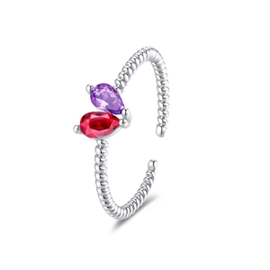 Twisted rope band open ring featuring pear-cut purple and red gemstones on white background