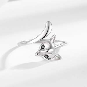 Polished silver fox open ring with black zircon eyes on minimalist white background