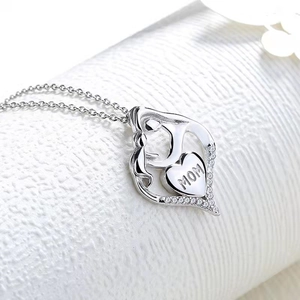 Silver mother and child heart necklace with MOM engraving and sparkling zircons