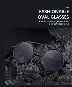 Détail de lunettes de soleil ovales en métal gris avec double pont sur roche