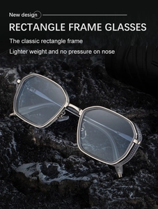 Detail of square silver metal frame sunglasses on a dark rock with mesh textured temples