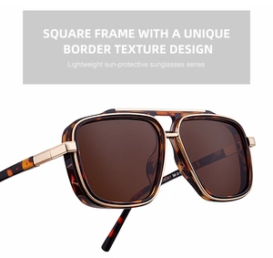 Detail of square frame sunglasses with leopard print texture and gold metal components