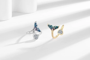 Detail of fishtail ring with purple gradient enamel and heart-shaped cubic zirconia