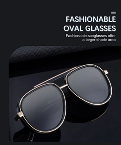 Detail of polarized aviator sunglasses with black oval frame and gold metal double bridge