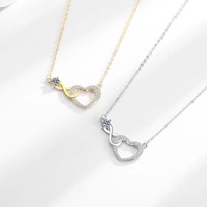 Interlocked heart and infinity necklace with sparkling diamonds in gold and silver finish