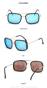 Detail view of square pilot sunglasses with ice blue lenses and gold metal frames